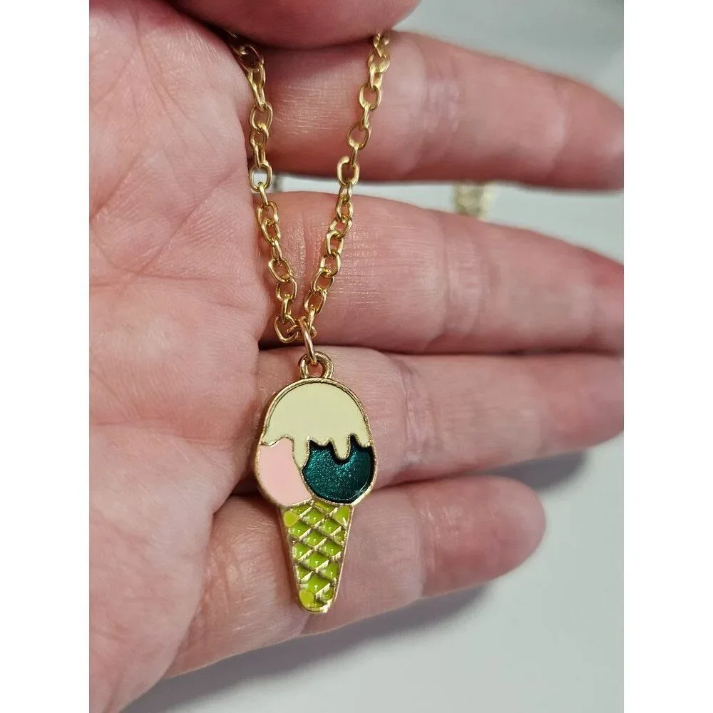 Gold tone ice cream pendant necklace 21-23
